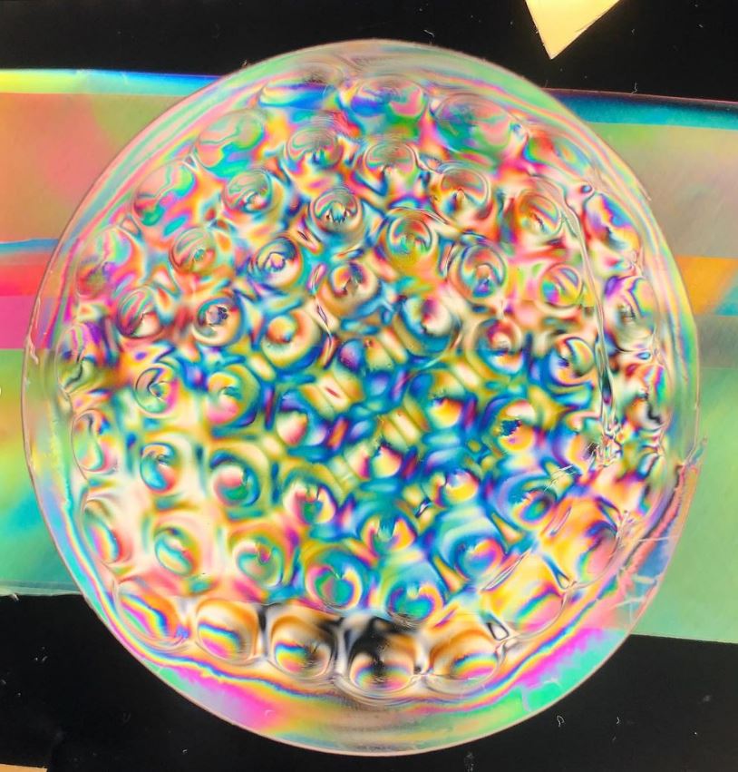 Image by Lilian van Daal showing infinite reflections through material stress through 3D printed Luximnprint lens